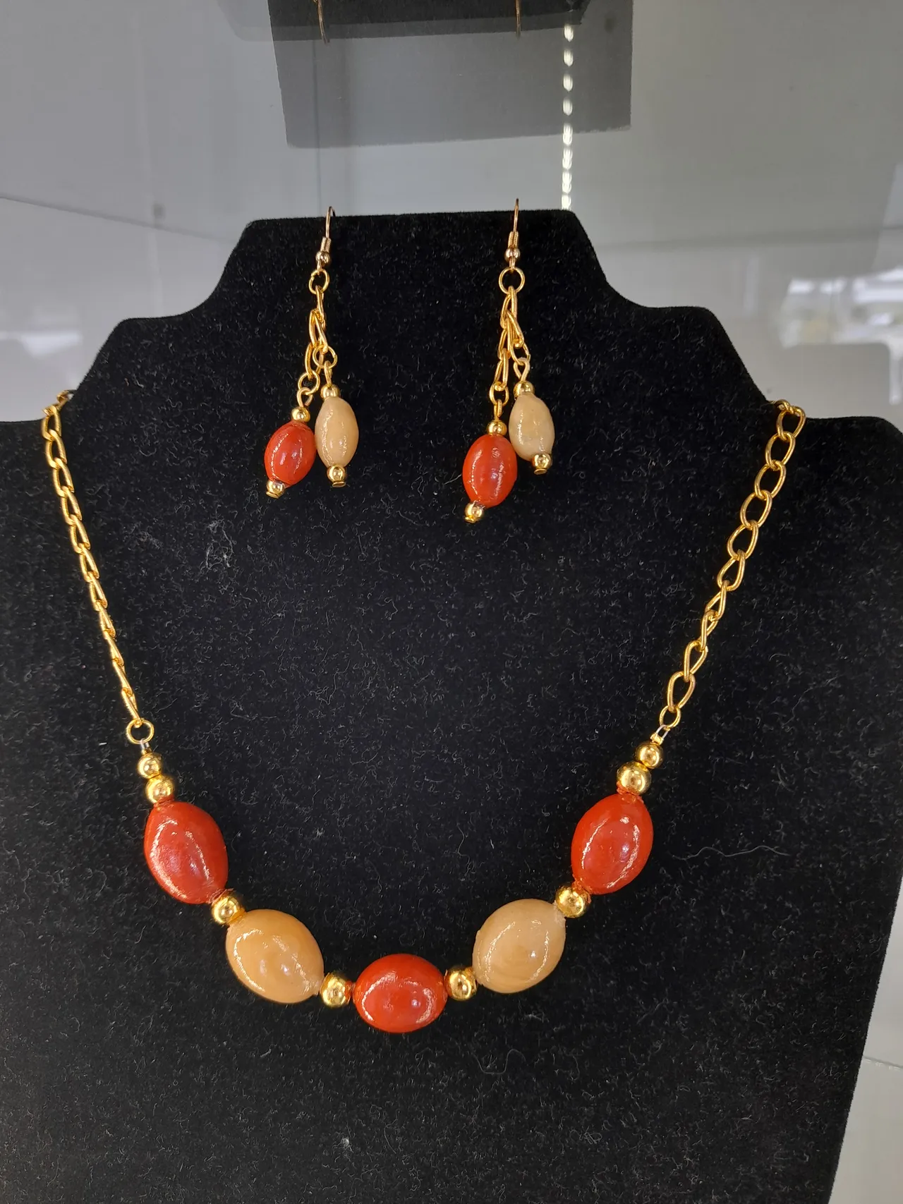 Parure Rouge brique et beige